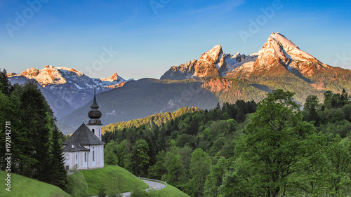 Panoramic view of Maria Gern church with snow-capped summit of Watzmann mountain photo