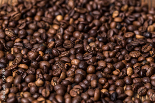 fried coffee beans. coffee beans, on a wooden background