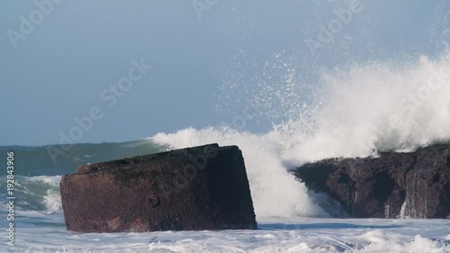 Waves Crashing on Boiler and Rocks Morocco Slow-Motion photo