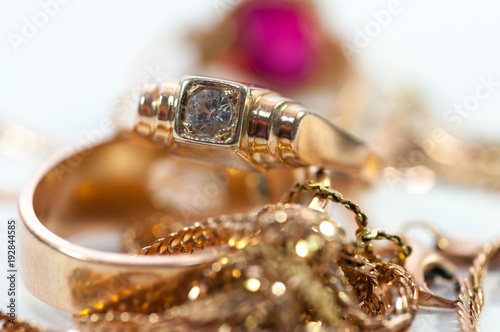 Gold jewelry  with gems , c...
