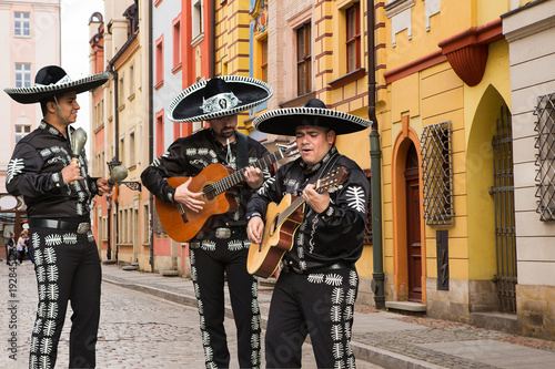 Mexican musicians mariachi on a city street