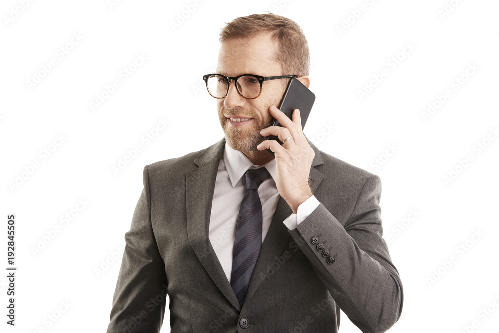 Executive financial businessman using cellphone Executive financial businessman using cellphone