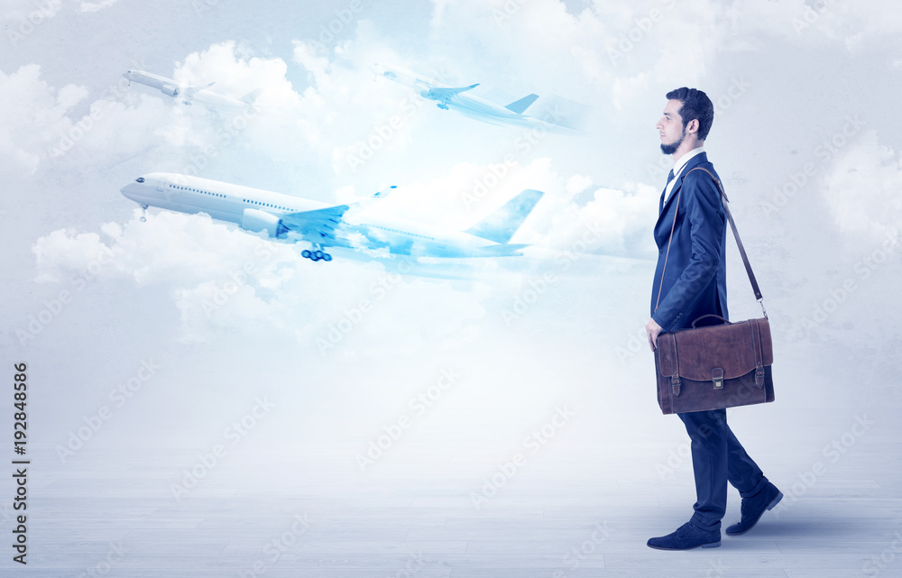 Businessman going somewhere with airplane Businessman going somewhere with airplane