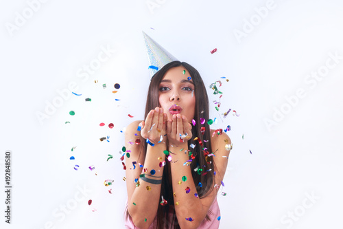 Happy party woman with confetti