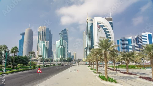 The high-rise district of Doha with traffic on intersection timelapse hyperlapse