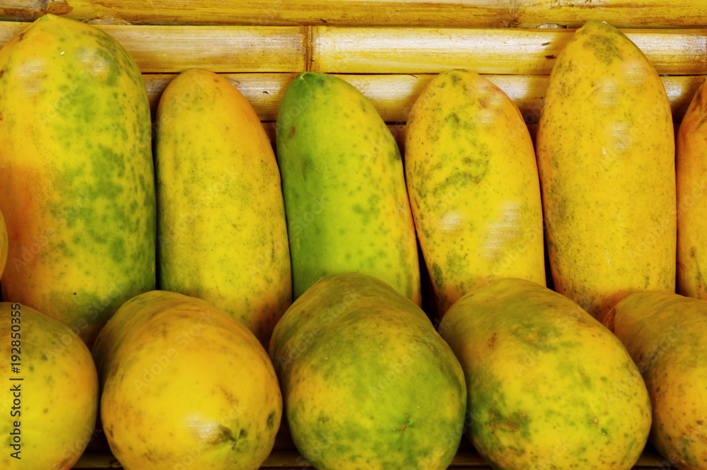 a lot of papayas in the market