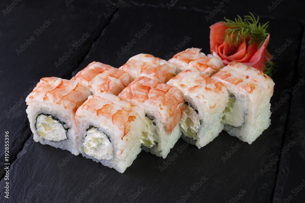 Shrimp roll on a dark background Shrimp roll on a dark background