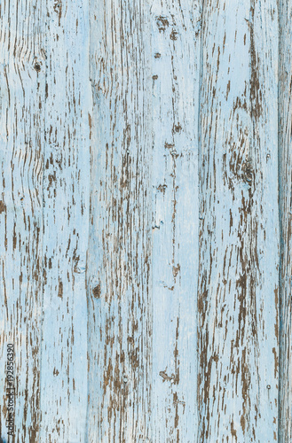 Vertical background of the old vertical boards are painted in light blue color