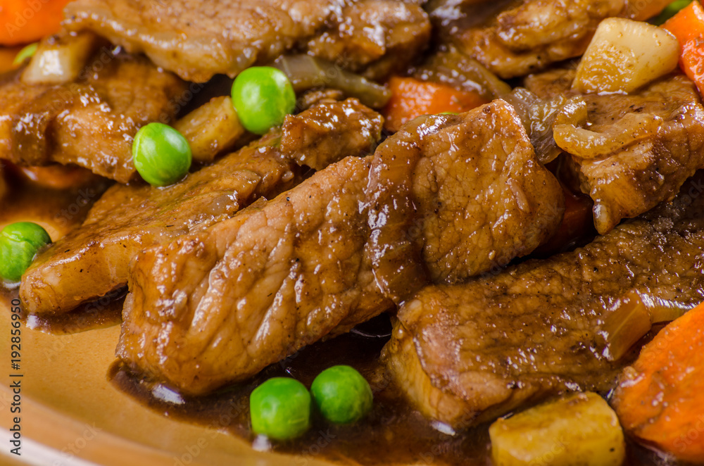 Pork medallions with vegetable and soy garlic sauce Pork medallions with vegetable and soy garlic sauce