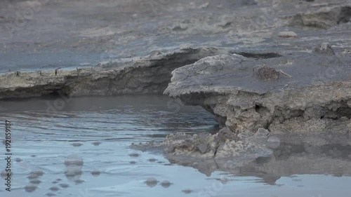 Iceland. Fumaroles and mud geysers of the geothermal field Hverfell photo