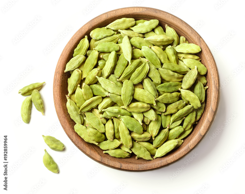 close up of dried cardamom isolated on white close up of dried cardamom isolated on white