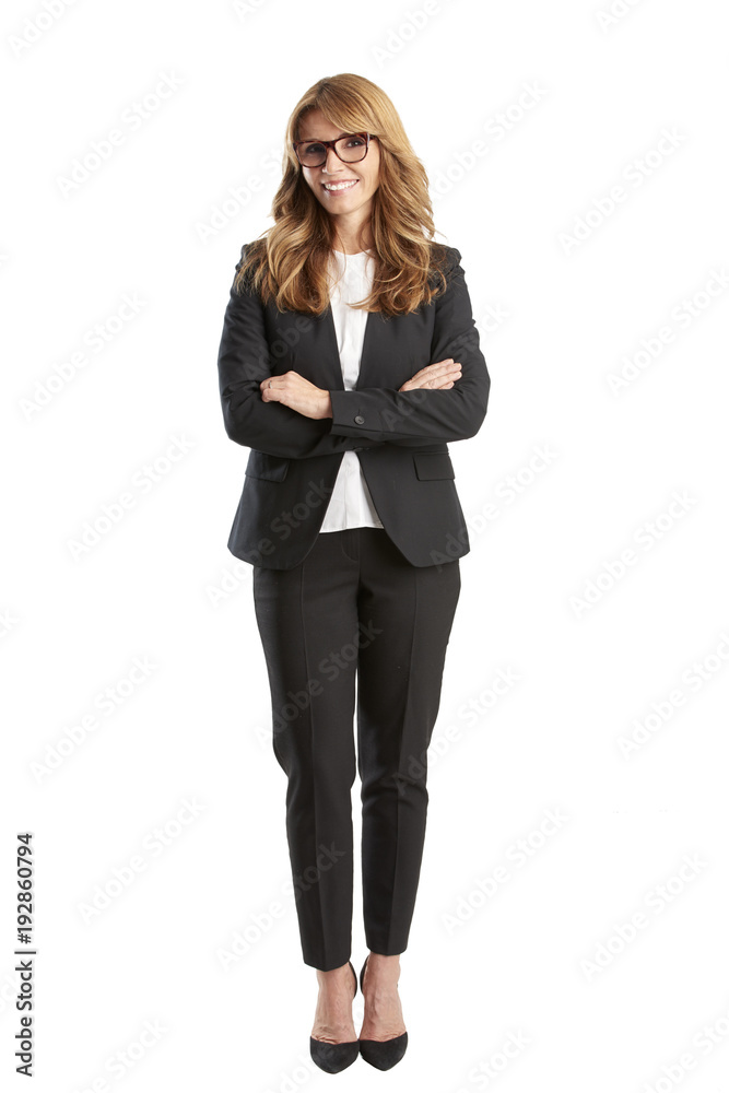 Successful lady portrait. Full length shot of a smiling executive businesswoman standing against isolated white background. Successful lady portrait. Full length shot of a smiling executive businesswoman standing against isolated white background.