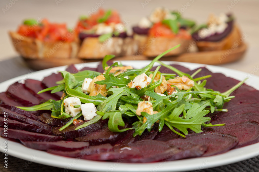 beet carpaccio, Bruschetta and sandwich with beetroot on the background - healthy food beet carpaccio, Bruschetta and sandwich with beetroot on the background - healthy food
