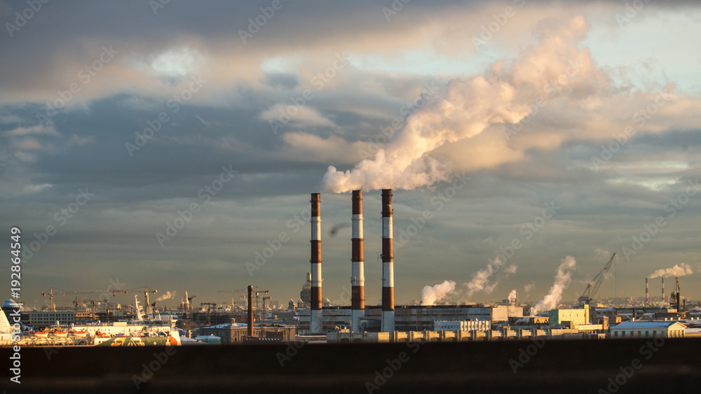 Energy. Smoke from chimney of power plant or station. Industrial landscape.