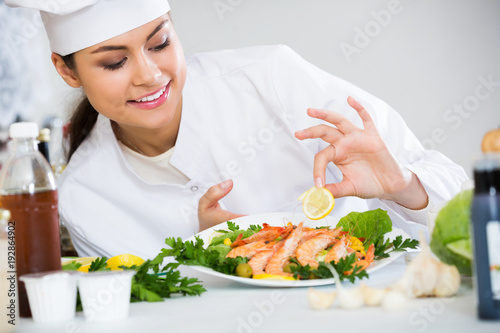 Professional chef decorating baked rainbow