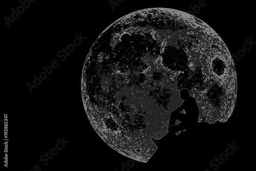 silhouette of the man sitting with the world image. 
