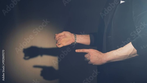 The disappearance trick of a diamond in the hands of a magician.