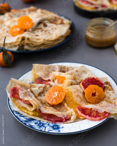 Maslenitsa. Crepe Suzet. Thin pancakes with honey and citrus