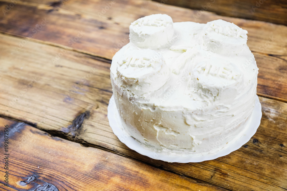 Homemade birthday's white cake for 7 year-old boy Round cake in brick shape. Right on photo Homemade birthday's white cake for 7 year-old boy Round cake in brick shape. Right on photo