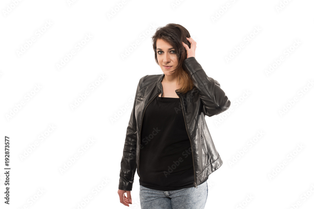 Woman in a leather jacket isolated on white Woman in a leather jacket isolated on white