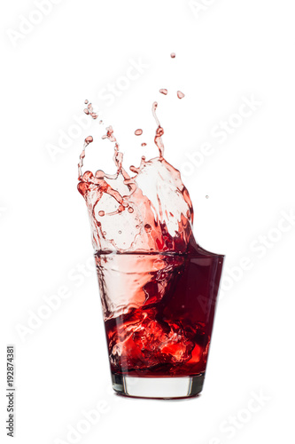 blueberries juice splash out of glass isolated on white background