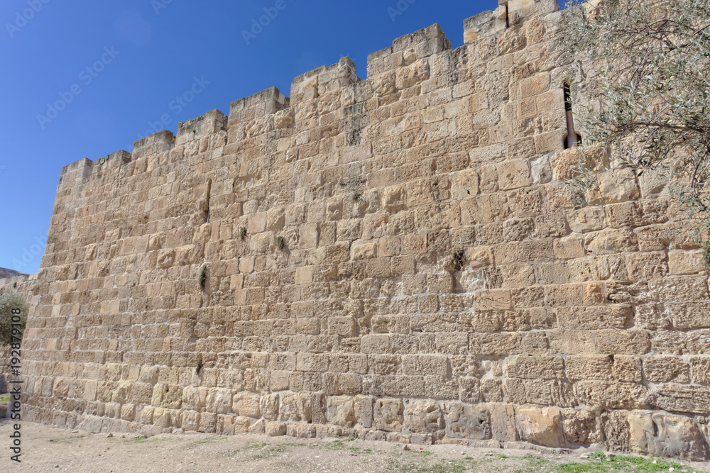 Fragment of an ancient stone wall of the Old City in Jerusalem.