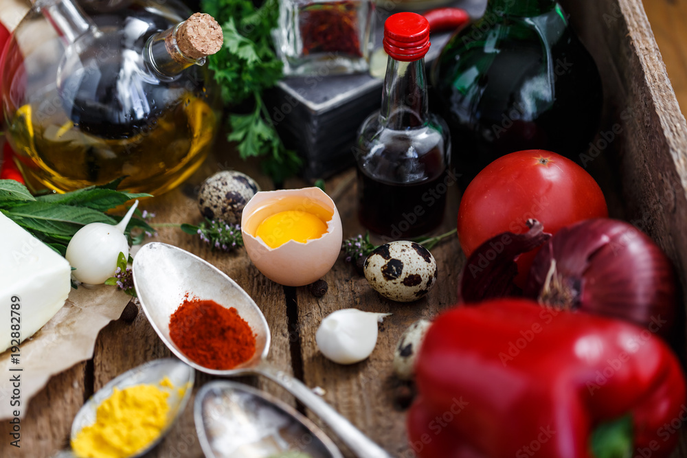 Close view of Big set of sauces and spices, with vegetables Close view of Big set of sauces and spices, with vegetables
