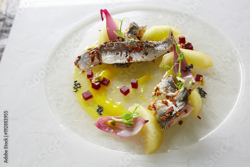 Salted Fish with Boiled Potato and Pickled Onions photo