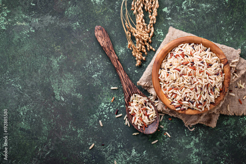 Mix of brown, red and wild rice in bowl