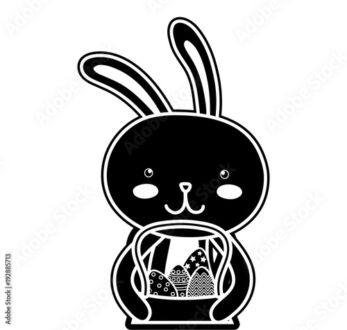 silhouette happy rabbit animal with eggs inside hamper