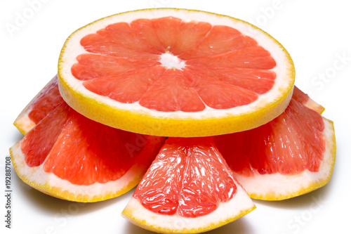 Grapefruit slices isolated on the white background photo