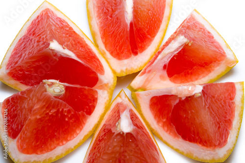 Grapefruit slices isolated on the white background photo