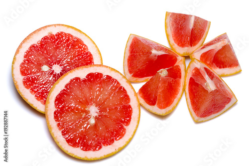Grapefruit slices isolated on the white background photo