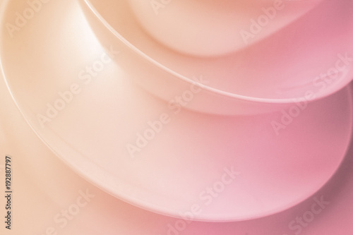 Abstract background with smooth lines in orange and pink color.