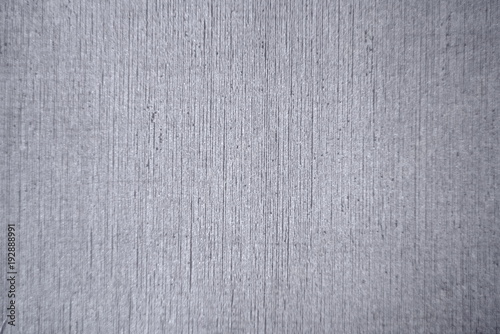 Textured paper background in gray colors.