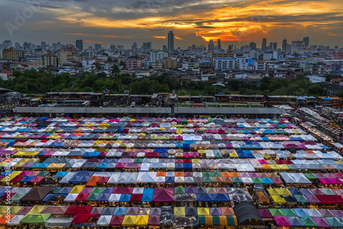 Multi colour Rod Fai night Market at sunset  located in Ratchada area of Bangkok  Thailand