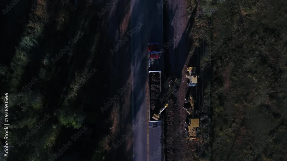 Aerial overhead road construction un the early morning. 