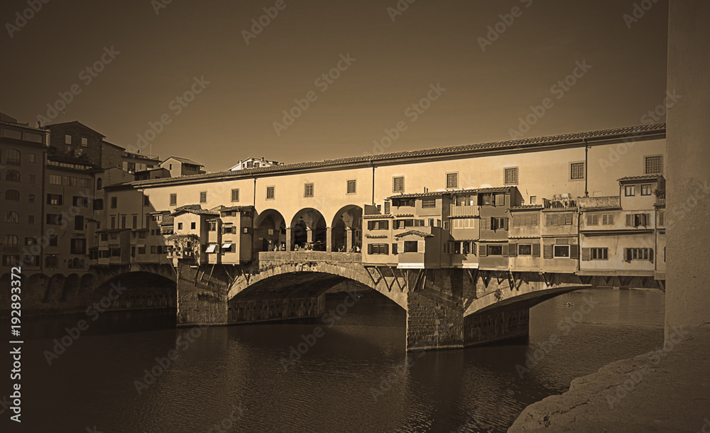 Fototapeta premium Vintage and vignetted view of Ponte Vecchio in Florence, Italy