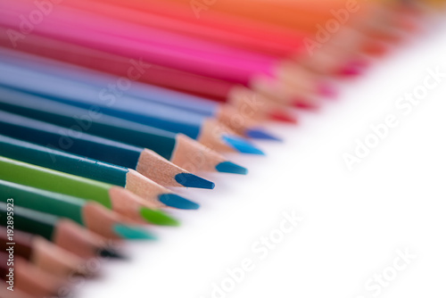 lined colour pencils on white background back to school 