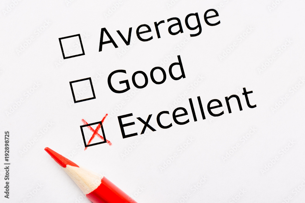 White paper sheet with checkboxes and red pencil. Survey asks the persons opinion whether it is average, good or excellent. Customer satisfaction White paper sheet with checkboxes and red pencil. Survey asks the persons opinion whether it is average, good or excellent. Customer satisfaction