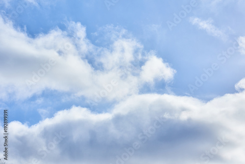 light cumulus clouds in the blue sky © Agave Studio