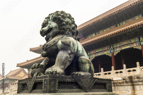 A bronze lion statue in front of Taihe Gate of Forbidden City
