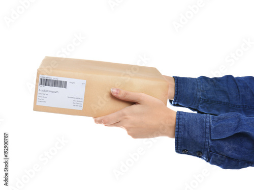 Woman with parcel box on wh...