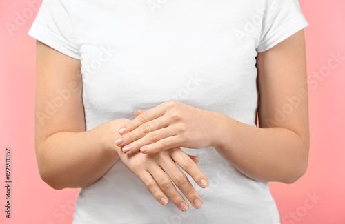 Wallpaper Mural Woman applying body cream onto skin, closeup Torontodigital.ca