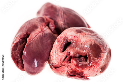 fresh raw pigs heart isolated on white background