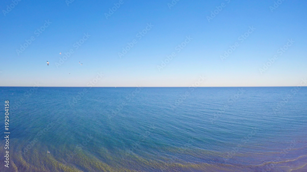 Early morning drone aerial view of South Australian beach with sun