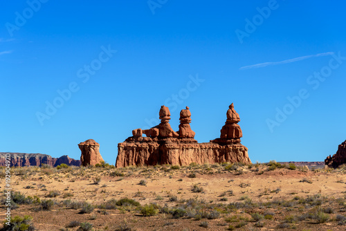 Isolated line of hoodoos, near the entrance to the valley, Goblin Valley State Park, Utah,