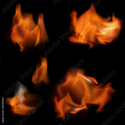 Set Fire sparks flying up. Burning glowing particles on black background.