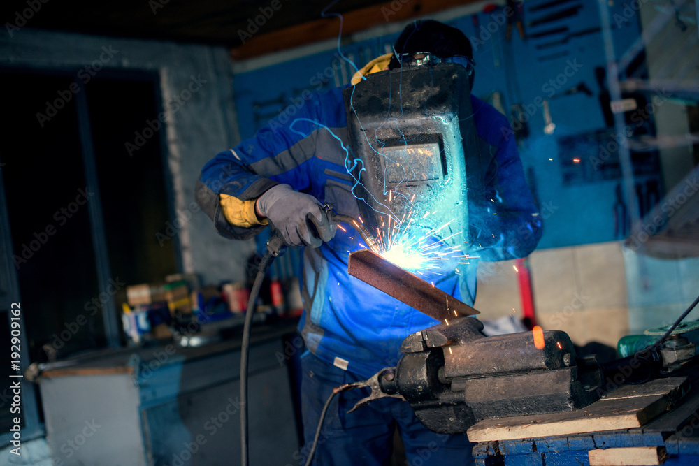 Man welding metal Man welding metal