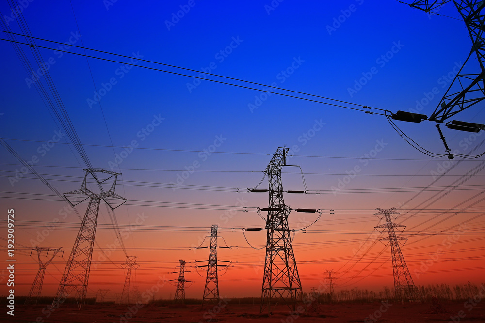 Fototapeta premium Sunset silhouette of pylon